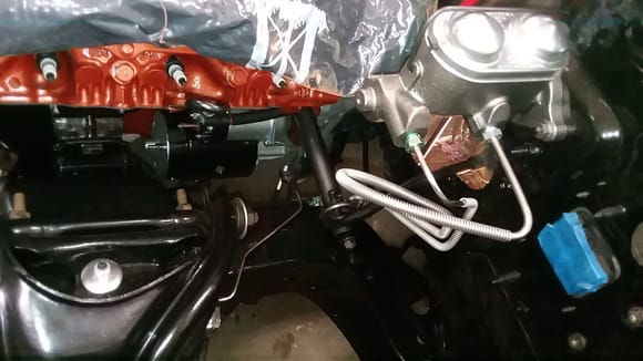 Got the new starter installed.  I found it better to remove the exhaust manifold to prevent scratching up everyrhing.