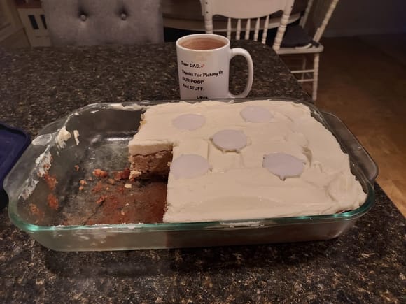 Speaking of desserts, my wife made me one of her ginormous from scratch banana cakes with real cream cheese icing last night.  Coffee cup for scale.  I haven't eaten all that already.  I cut out a big piece and took it over to our neighbors across the street.  Wife won't eat any of it since she's counting calories right now (even though she doesn't need to).  Luckily it freezes well, so I' cut most of it up into meal size pieces and freeze them for when I really want a treat.