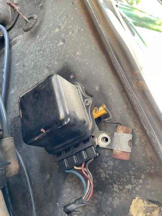 Need help removing the wiring harness from this voltage regulator. Any tips would be helpful 