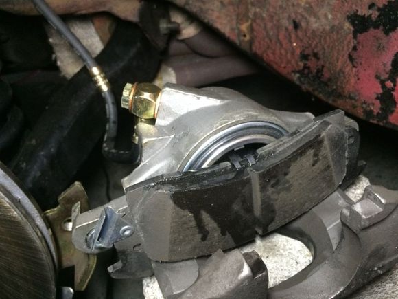 fluid running on pad when caliper on cinder block