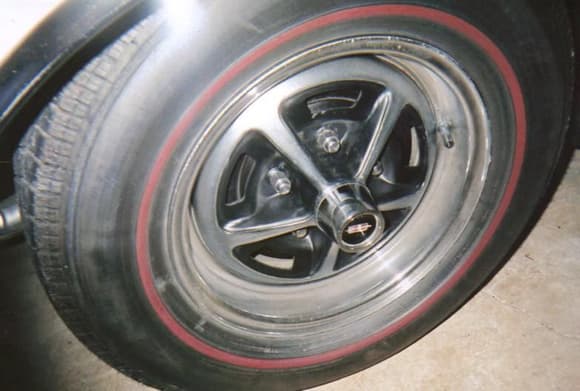 Here is a pic of the Super Stock I wheel.  It will not fit on cars with disc brakes.