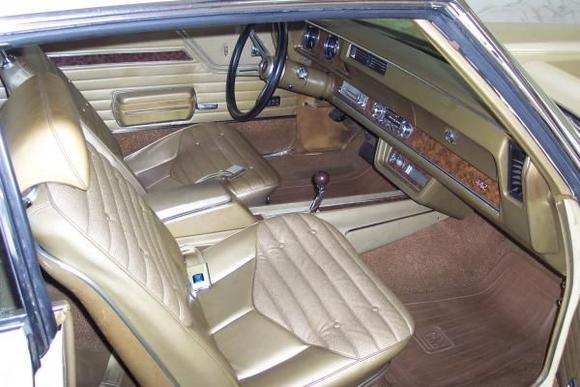 Gold interior all original except for the drivers seat.