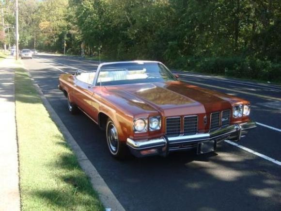 Fresh off the car hauler from SC. A &quot; Persimmon&quot; 1975 Delta Royale. She is fully optioned with a 455 4 bbl. She's still a young'in with only 38,000 original miles on her. Life is good !