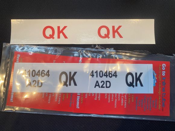 QK oil tube stickers from different vendors