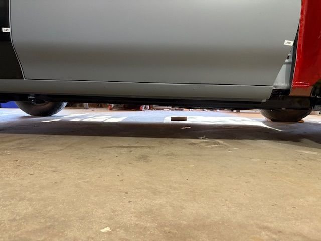 Bottom edge is very consistent, and top of door metal lines up with QP.