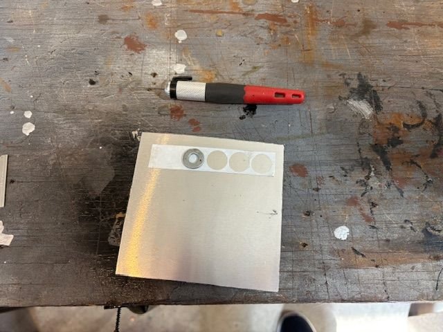So, this is where I go in the ditch sometimes.  I used a same size washer to cut circles of vinyl tape to mask the area.  