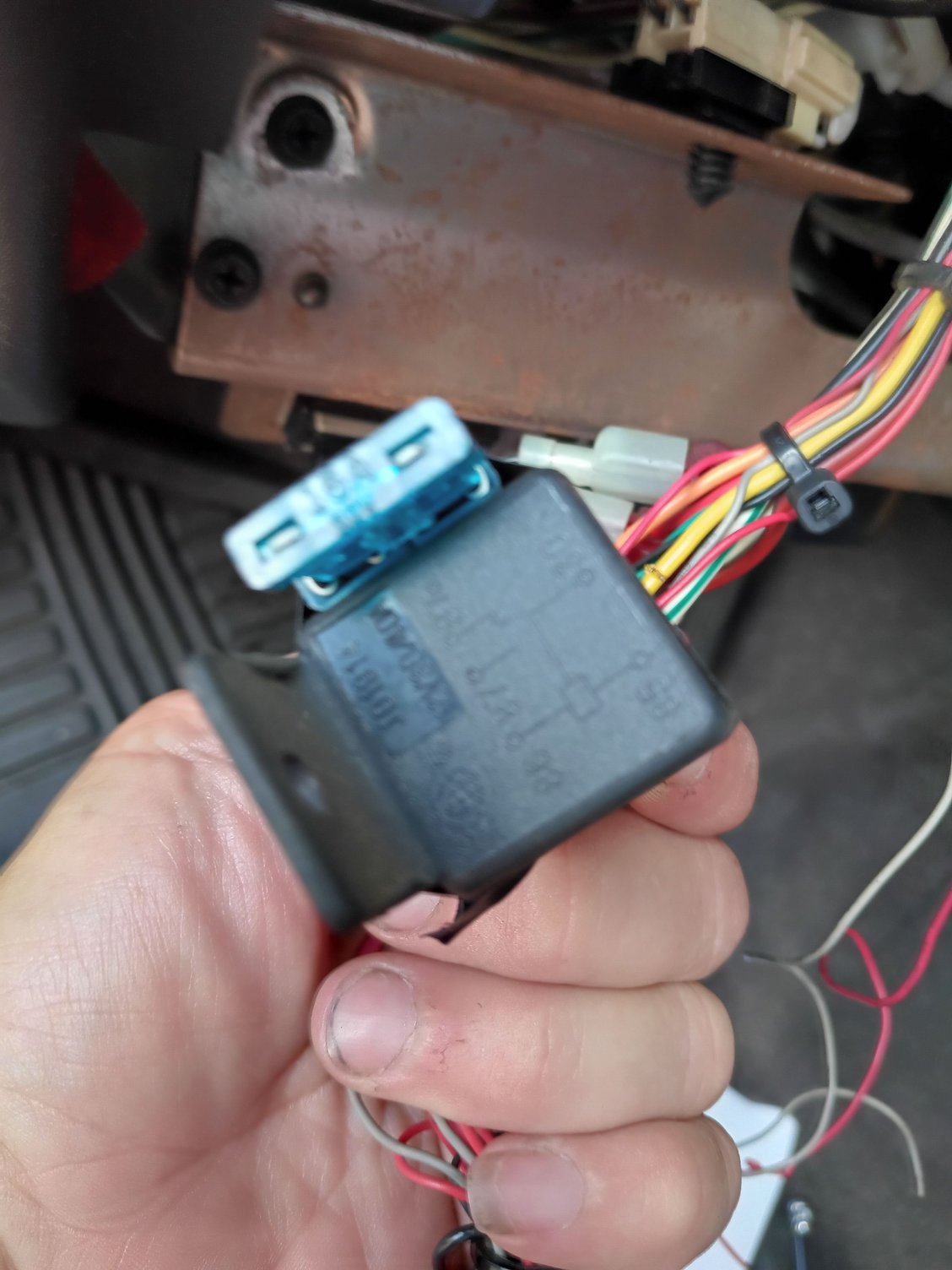Fuse attached to a relay