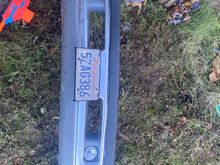 As luck would have itt my neighbor had a spare bumper he traded to me for a case of  beer.  Here it is with my license plate added. Looks like I get to add fog lights to the truck