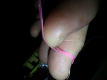 SUPER thin almost not there rubber band keeping the 2 together.. how they are so cheap, stuff like this me thinks.