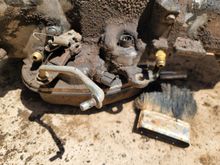 I suspect the two brass fittings indicate hydraulic actuation? 