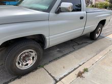Epoxy primer and with the Craigslist rims and new tires installed.