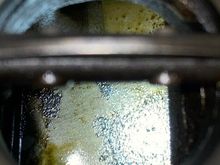 Phone camera doesn’t catch it well but there is much more oil than it appears in the photo.