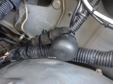 And here it is attached to the hose that goes to the vapor canister.  It sits up higher now, and away from the steering column.