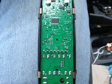 Be careful not to just flip the whole thing over at this point as the buttons are loose underneath.