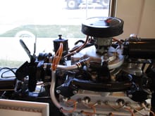 The carburetor sits on top of the supercharger. State of the art in the 30's.