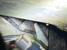 Could this be a culprit? It looks to be pinched under the bolt that holds in my dip stick. (This is the wires that go to the crankshaft position sensor) Although when 