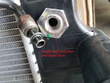 New radiator with OEM trans line