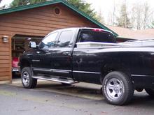 Leveling kit in front end,   nitro shocks. back end is sitting in a small water ditch, needs a inch or so more in the back. plans are for air bags to level it out