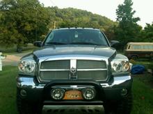 Aries bull bar, fog lights, blacked out cab lights, and gutter guard grille