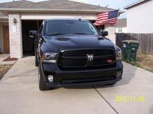 my ram with a patriotic flag in background.