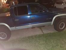 Ditched the topper & went with a fiberglass tonneau cover. Had a roll bar that I really liked the look of, but it would work with the cover. So more modifications & customizing come.