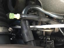 The hose with the green cap. Axel Breather Hose?
