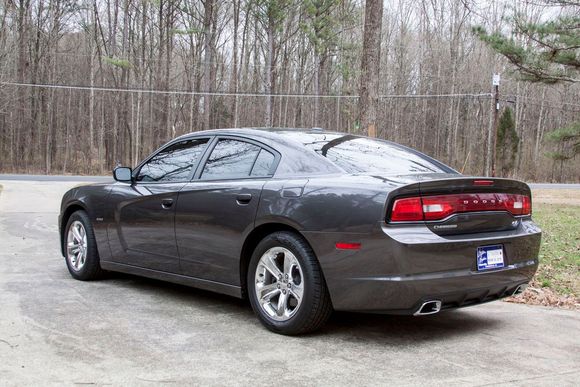 I like the the touring look of no spoiler. Dodge did a fantastic job. Window tint and wax jobs are the only exterior mods that will happen.