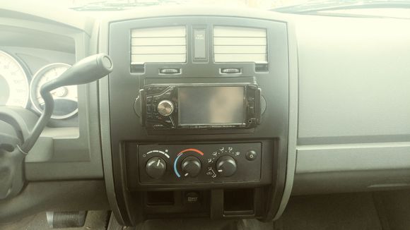 Not a great pic, but plasti dip radio bezel