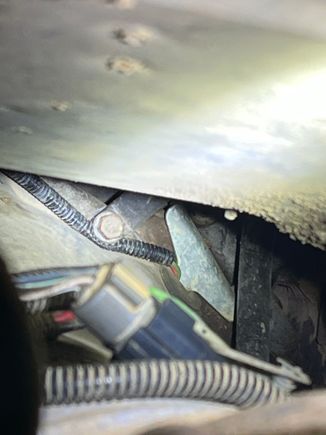 Could this be a culprit? It looks to be pinched under the bolt that holds in my dip stick. (This is the wires that go to the crankshaft position sensor) Although when 