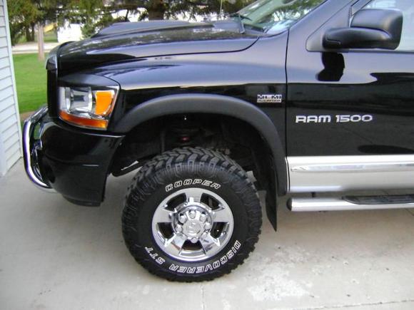 Added Hell Bent Steel 2" leveling kit, Mo-par Cold Air Kit, Magnaflow Dual exhaust, Bully Dog programmer, Cooper STT Tires, Wes-tin Bull Bar w/ driving lites, Century Topper, Mo-par seat covers, Power-wagon Fender extensions, Headlight eyebrows and a Hood bump
