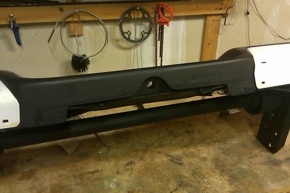 Bumper repaint/undercoated.