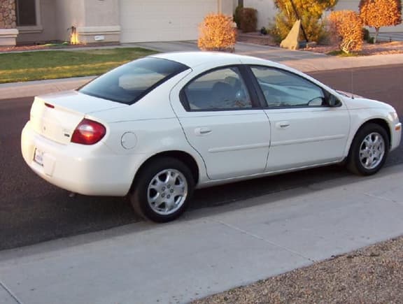 first side shot== Pinstripes,door moldings,no tint,no exhaust,no lip kit and skirts,no spoiler,no ram head sticker