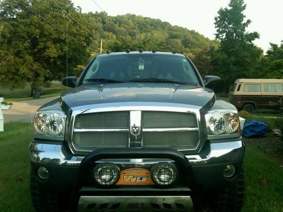 Aries bull bar, fog lights, blacked out cab lights, and gutter guard grille