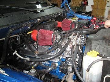 In and runnin.. Yes that is my air cleaner and no it doesn't pull too much hot air.