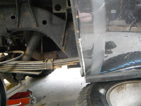 Zip disc up the line but not going through at the top.
Fold the cut piece behind the fender and weld in place.