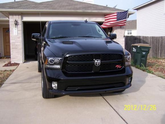 my ram with a patriotic flag in background.