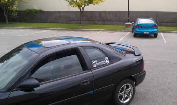 after market spoiler and blue stripes