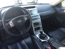 Stock interior when I got it. Steering wheel and shift knob left reside on my hands when I drove it and previous owner left tape adapter for music on phone.