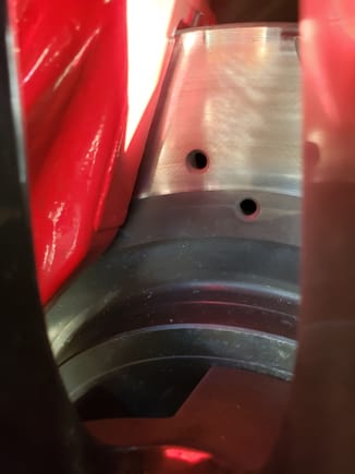 The gap at the top looks correct but should the inside of the caliper as in the gap from the bottom of the caliper to the rotor correct.( the the surface of the rotor)