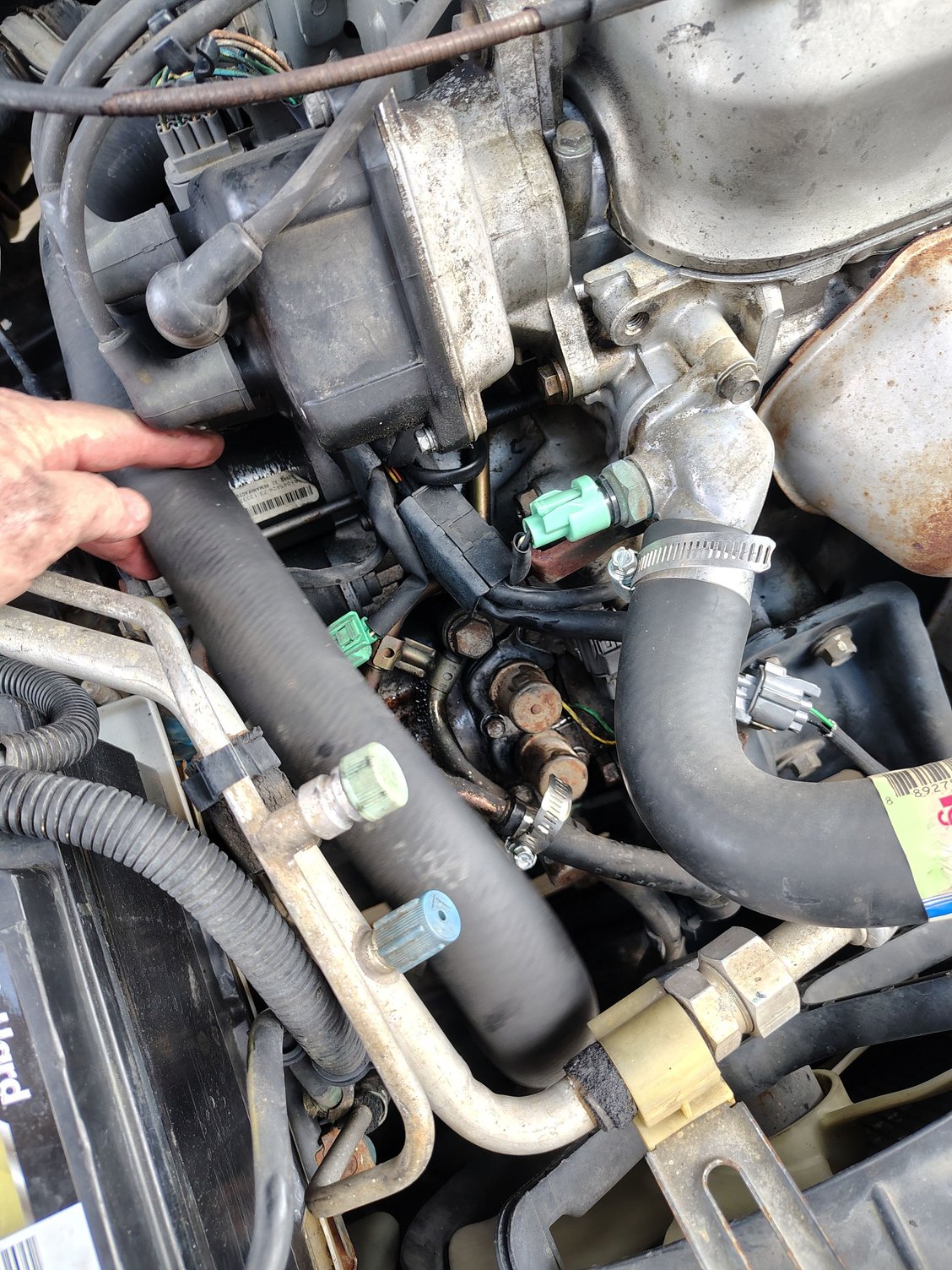 Floppy coolant hose. Bracket attachment or orientation unclear ☹️