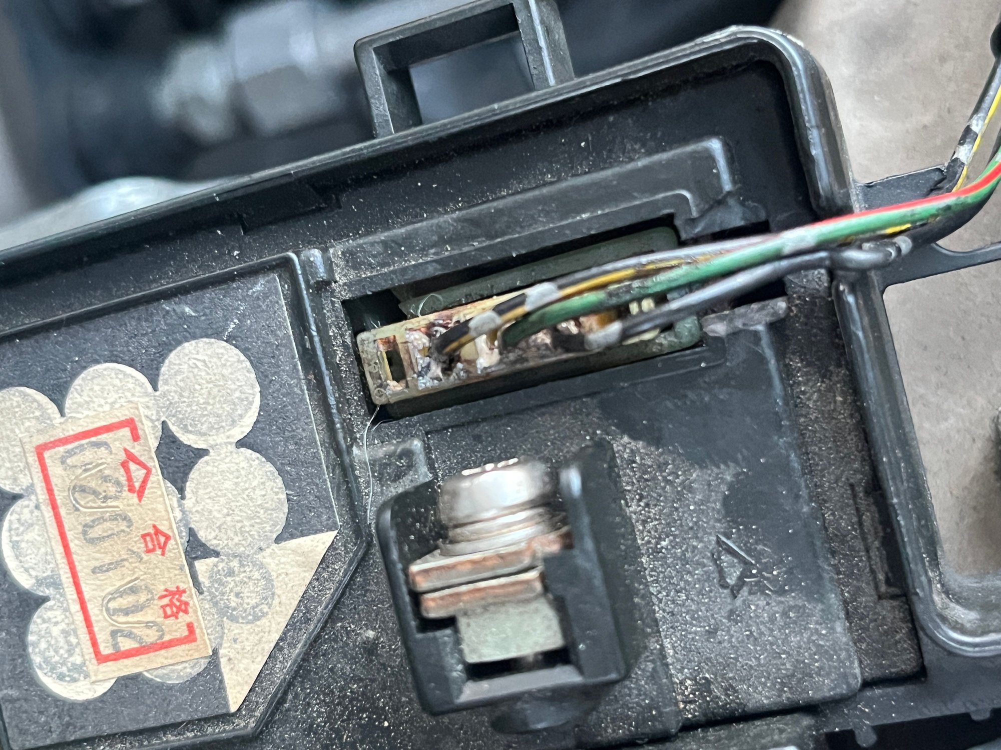 during my diagnostic, I found this connection at the engine bay fuse box which I assume is the �main wire harness connector� and due to its condition it can be considered shot or can be re-wired from here to allow a ground voltage to be received to the main relay.