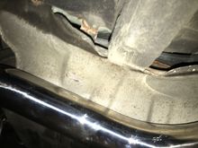 S-pipe pushed back 1 1/2", against the back of the heat shield
