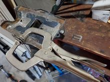 Then cut the piece with the 2 slots in it intontwo pieces, 1 for each side of the battery tray.  The tabs are needed in order to move the mounting point for the j hook on the bolt to attach to - they are too short to reach in the stock battery tray.