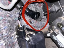Rubber around harness where i decided to poke a hole through, i think i might have punctured a wire and thats why i have the lights on.