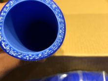 New hoses. Which don’t smell like anything by the way.... 5 layers if you count the gloss blue and internal light blue layers. I think they’ll work just fine