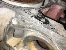 See how close the water pump housing is to the hole where the head bolts thread into.