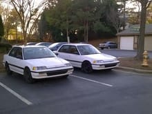 My car on the right, this is after i removed the hub caps and the old lady door bumper molding