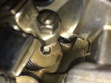 In the little crevice where fingers don't fit
