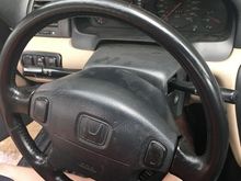 Leather wheel cleaned and refinished, looks decent.