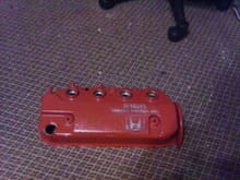 5 coats of paint later, and hand polishing the letters, here is the new valve cover.